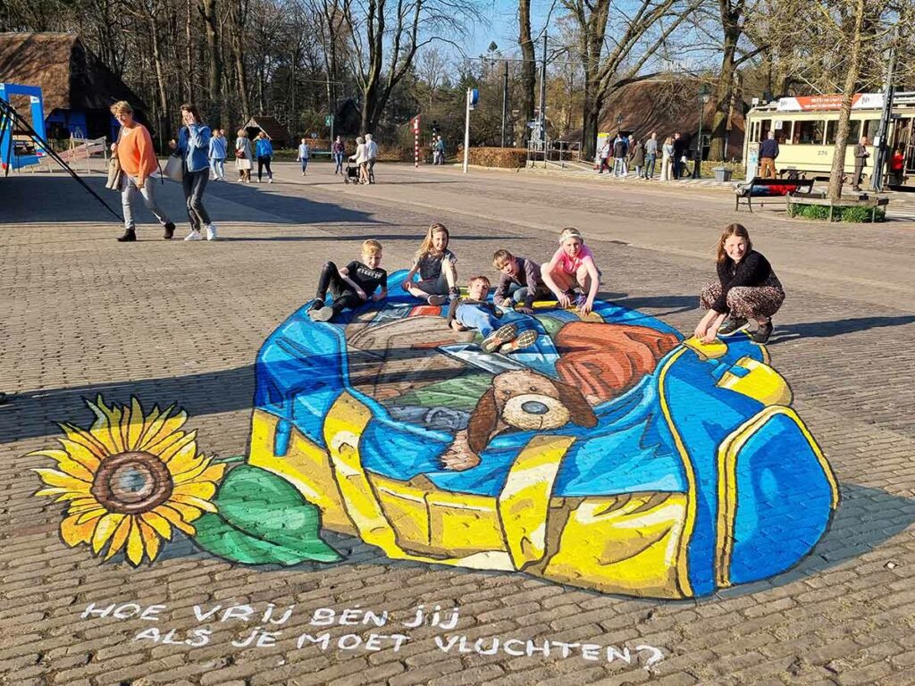 3D Streetpainting ‘Hoe vrij ben jij’ designed by Remko van Schaik for Openluchtmuseum, Arnhem.